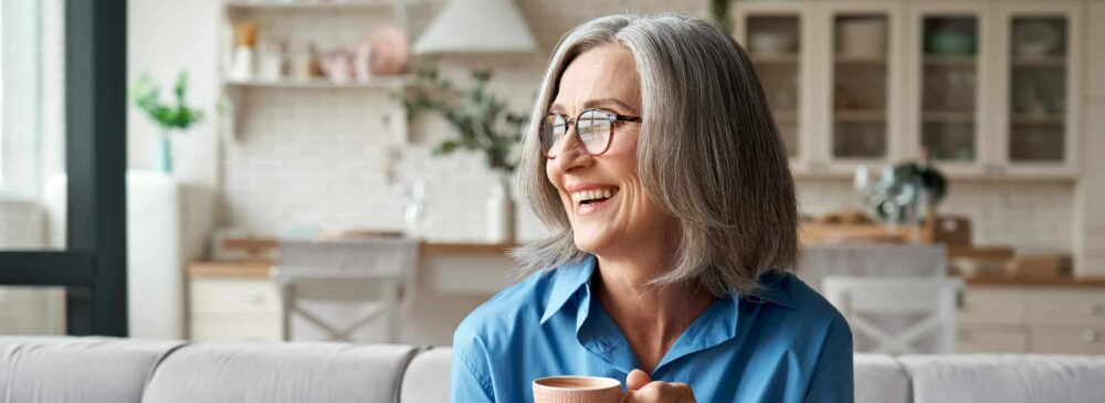 Smiling older woman at home